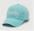 Teal ponytail baseball cap with built-in hair tie